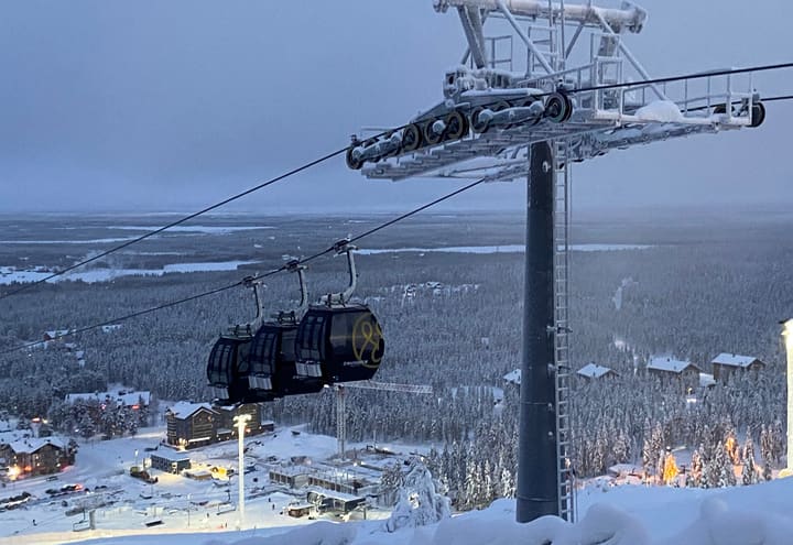 Gondola lift climbing Levi fell above the snow-covered resort in Finnish Lapland